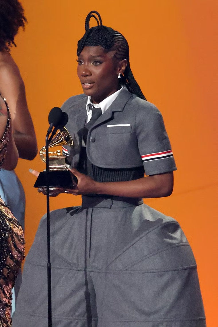 Doechii accepting the Grammy for Best Rap Album for Alligator Bites Never Heal